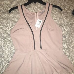 Light tan/pinkish peplum blouse